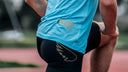 Runner outdoors in SA1NT LAYERS running kit and compression shorts during an autumn training run