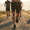 SA1NT LAYERS Men's P1 Elite Compression Shorts, worn outdoors on a road run