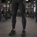 SA1NT LAYERS Men's P1 Elite Compression Tights, worn in an indoor training hall