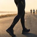 SA1NT LAYERS Men's P1 Elite Compression Tights, worn outdoors on a road run
