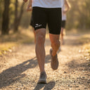 SA1NT LAYERS Men's P1 Race Compression Shorts, worn outdoors on a road run