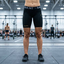 SA1NT LAYERS Women's P1 Elite Compression Shorts, worn in an indoor training hall