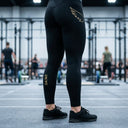 SA1NT LAYERS Women's P1 Elite Compression Tights, worn in an indoor training hall